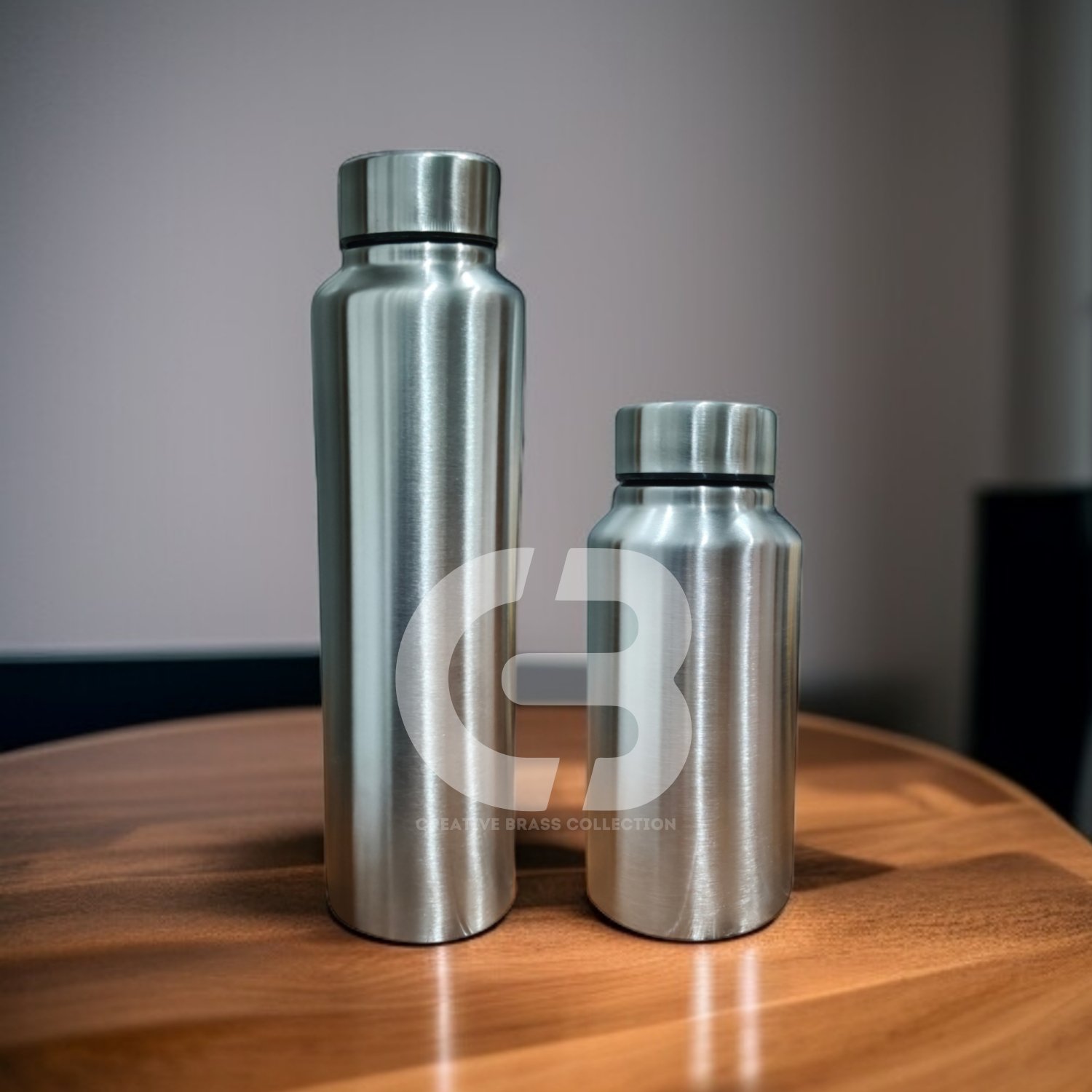 Stainless Steel Bottle Set, featuring a large slim bottle (26 cm) and a small compact wide-mouth bottle (16.5 cm). Combo pack of two lightweight, brushed metal water bottles